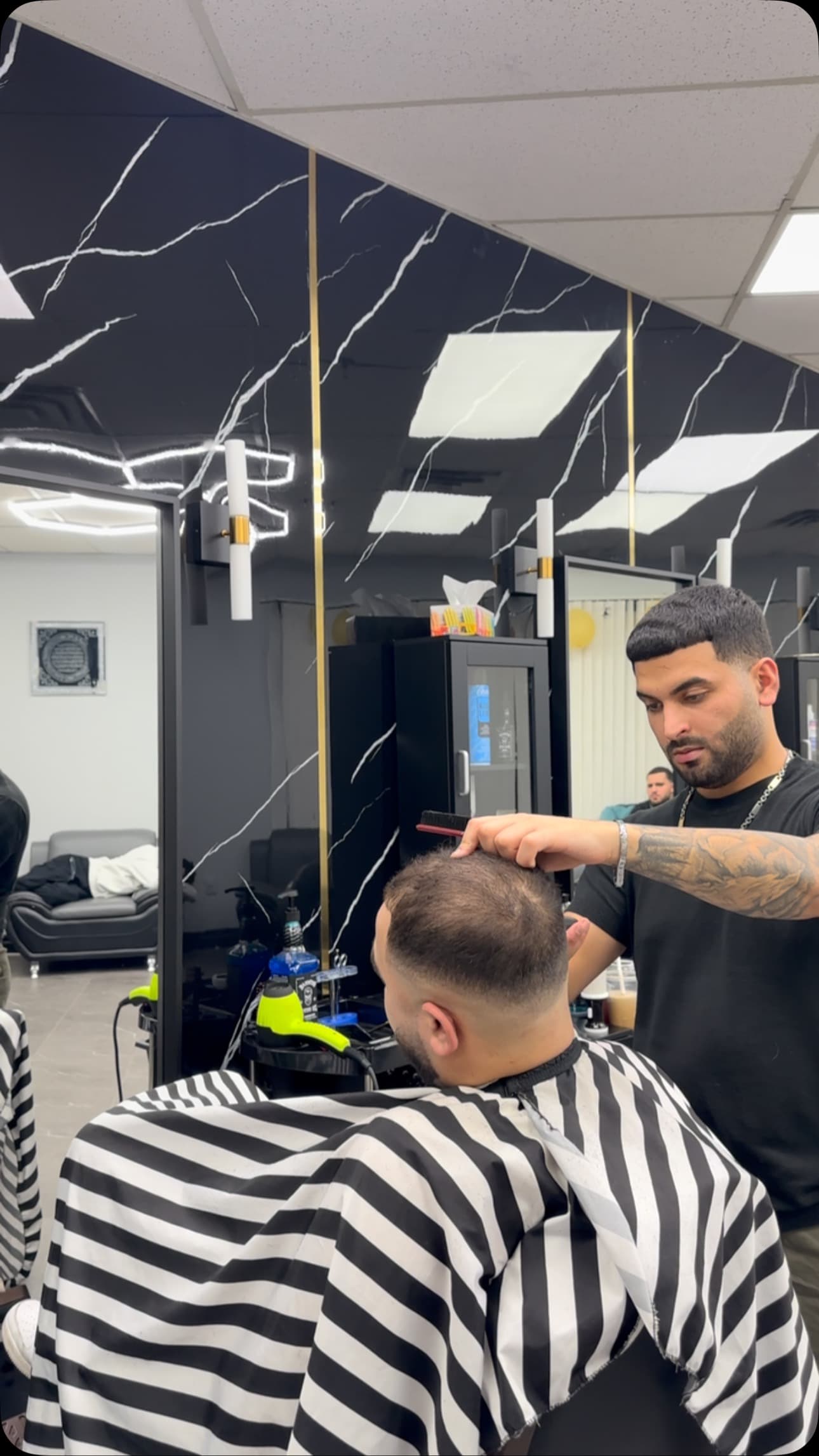 Arkan Barber providing professional haircut service in Mississauga